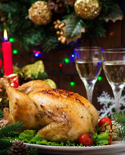 christmas-table-served-with-turkey-decorated-with-bright-tinsel-candles (2) (1)